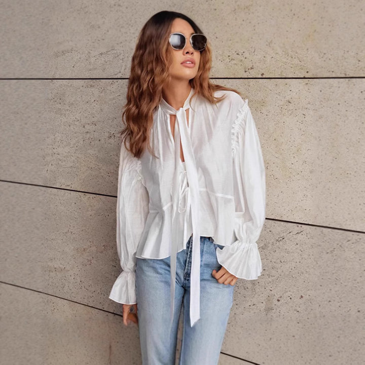 Fluid blouse for women with ruffles and a bow detail Chic und Stil