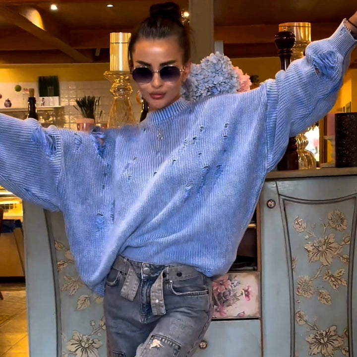 Casual women's sweater with a trendy ripped design and voluminous sleeves Lune London