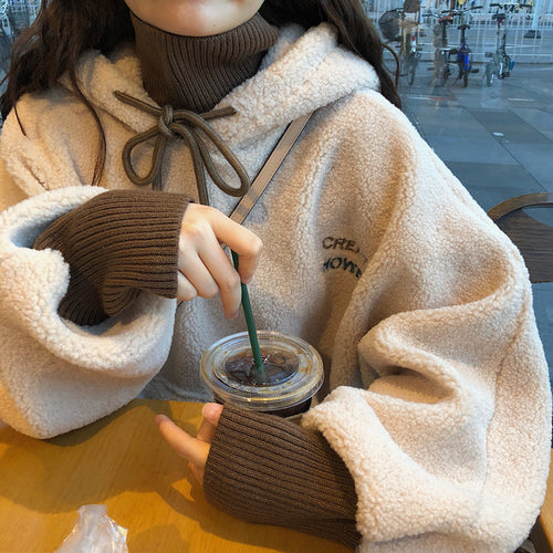 Women's cozy oversized hoodie with front kangaroo pocket and elastic cuffs Lune London