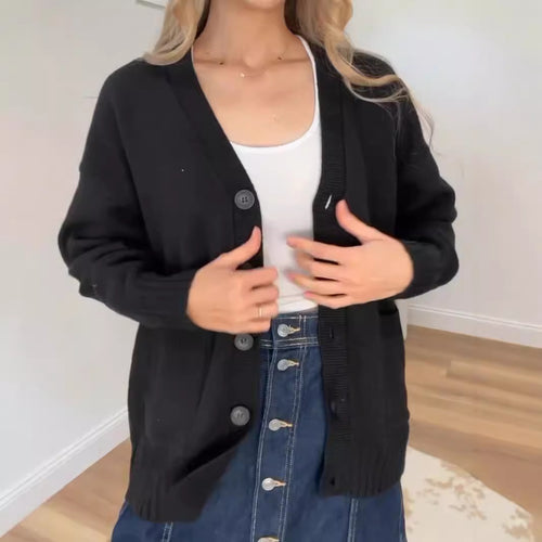 Women's knitted jacket with pockets and modern buttons Lune London