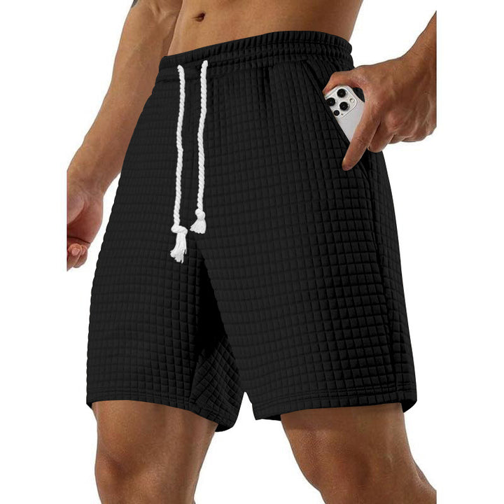 Men's sports shorts in breathable material with practical side pockets Lune London