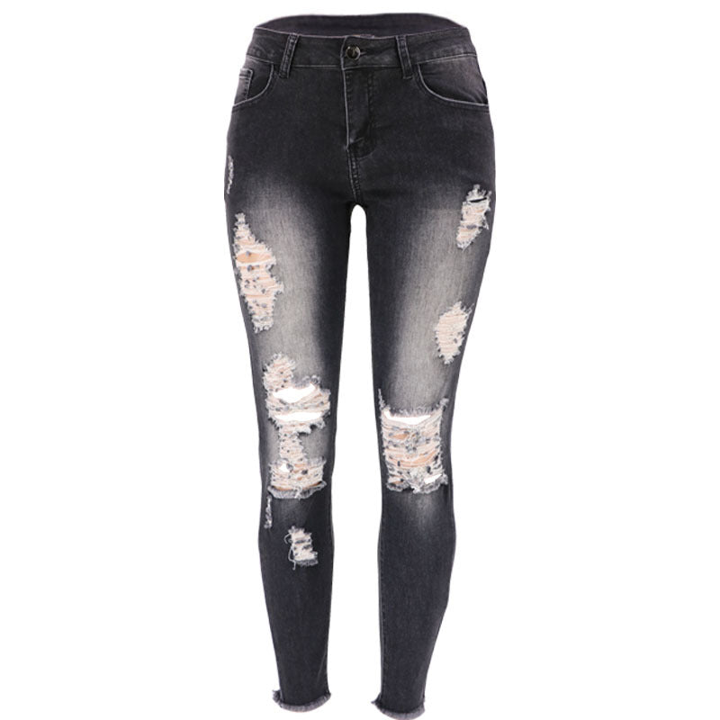 Jeans skinny pour femmes en look usé avec des déchirures marquées Lune London
