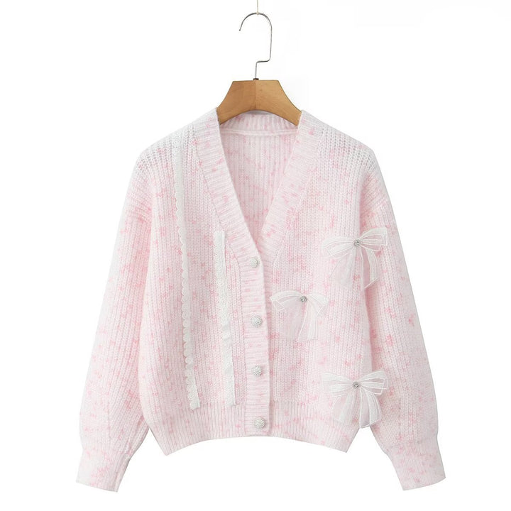 Women's knitted jacket with decorative knots and a delicate pattern Lune London