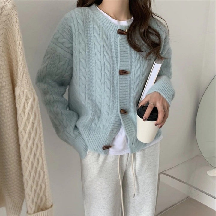 Cardigan pour femmes avec motif en maille torsadée et détails de boutons élégants Chic & Stil