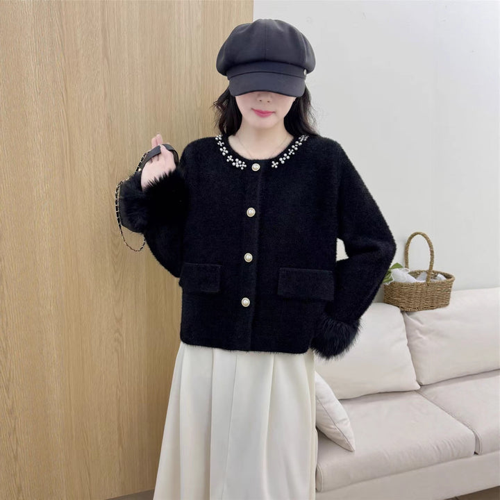 Cardigan élégant pour femmes avec décoration de perles et manches duveteuses Chic & Stil