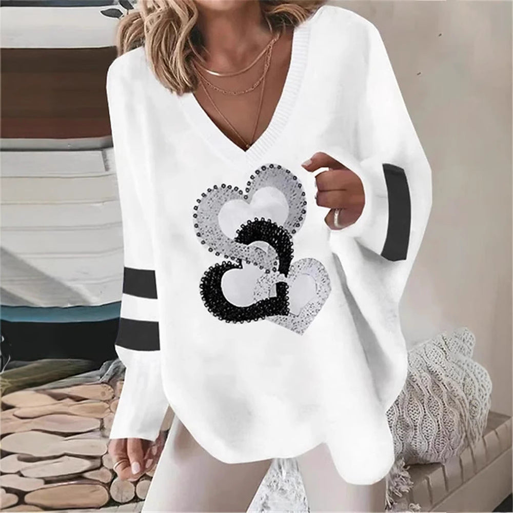 Hoodie pour femmes avec motif cœur et élégantes rayures contrastées Chic & Stil