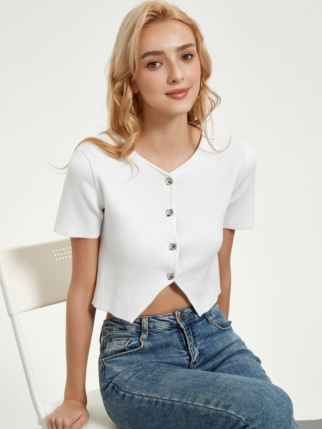 Short sleeve blouse for women with decorative button details Lune London