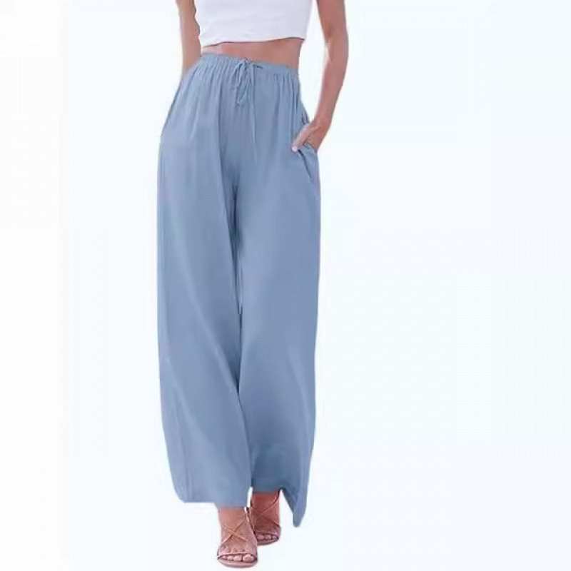Wide palazzo pants for women with elastic waistband and side pockets Lune London