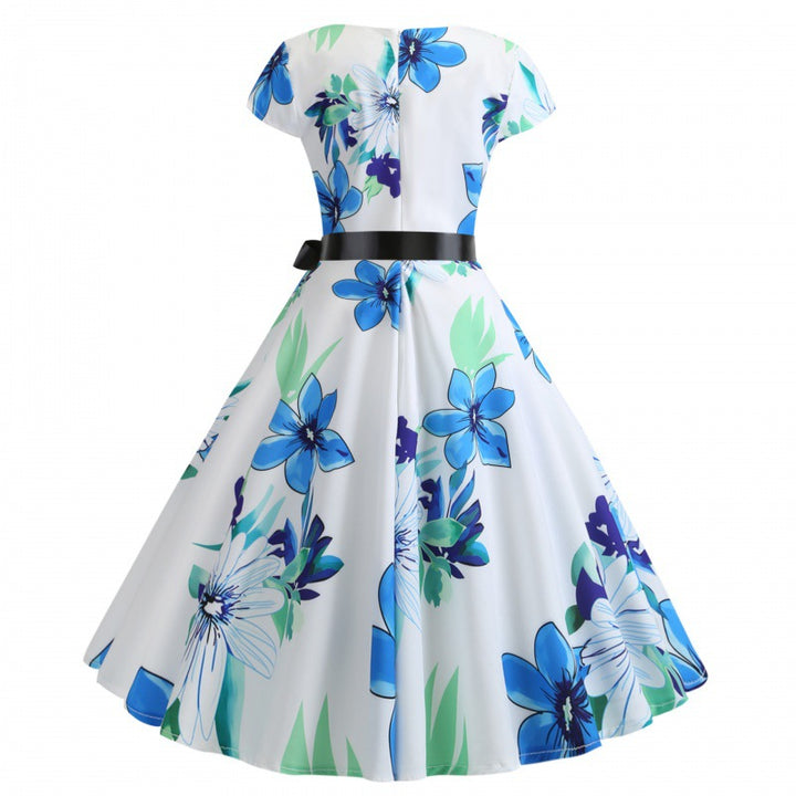 Robe swing femme avec des motifs floraux et une ceinture élégante Chic & Stil