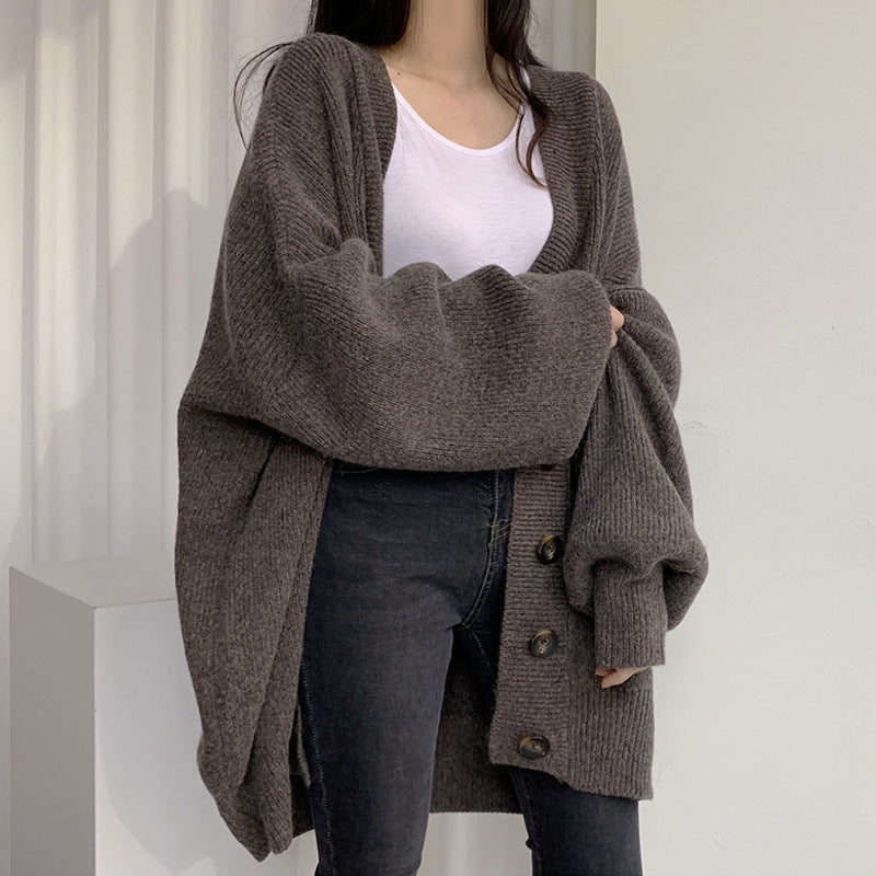 Ladies large knit cardigan with oversized cut and decorative buttons Lune London