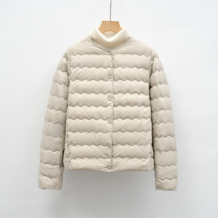 Ladies lightweight quilted jacket with high collar and elastic cuffs Lune London