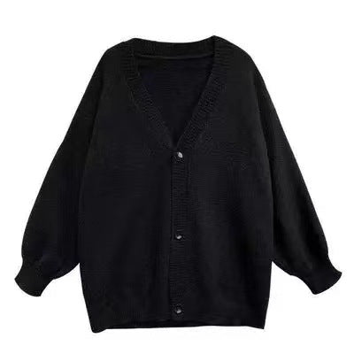 Ladies Cozy Knit Pullover with Voluminous Sleeves and Button Details Lune London