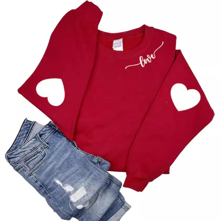 Sweatshirt femme avec design cœur et coupe décontractée Chic & Stil