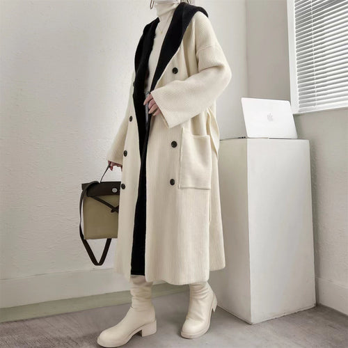 Elegant ladies long coat with belt and contrasting sleeves Lune London