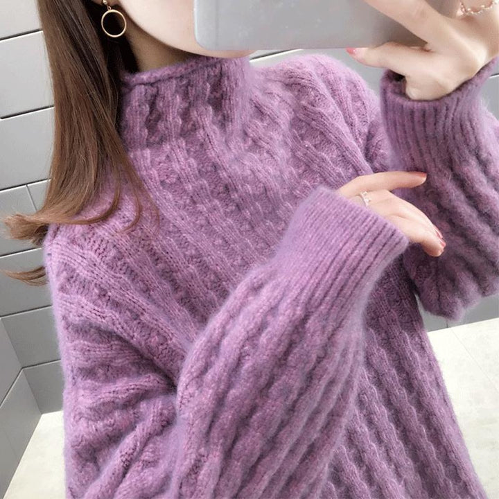 Knitted sweater for women with a modern ribbed design featuring a high collar and relaxed sleeves Lune London