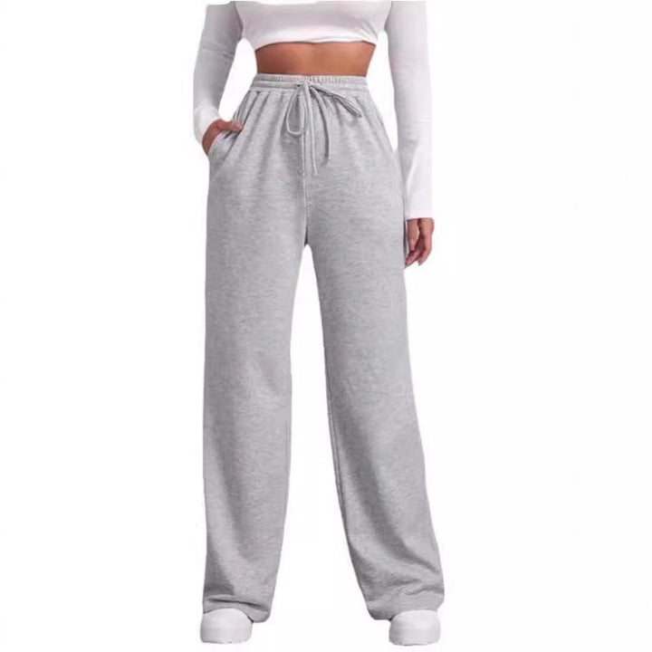Women's loose-fitting leisure pants with elastic waistband and side pockets Chic & Stil