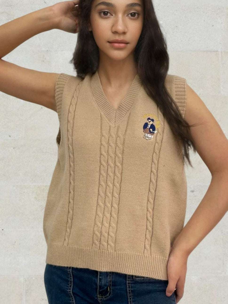 Knitted vest for women with V-neck and embossed pattern Lune London