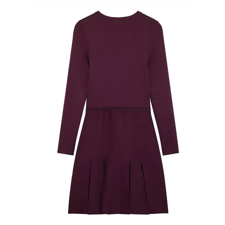 Knitted dress for ladies with decorative button details and practical pockets Lune London