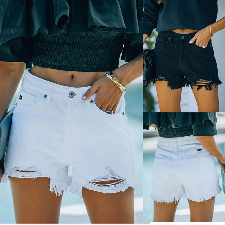 Denim shorts for women in a casual destroyed style with frayed hem Lune London