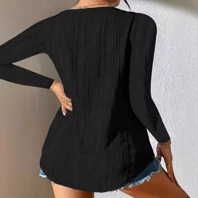 Women’s top with textured surface and elegant button detail Lune London