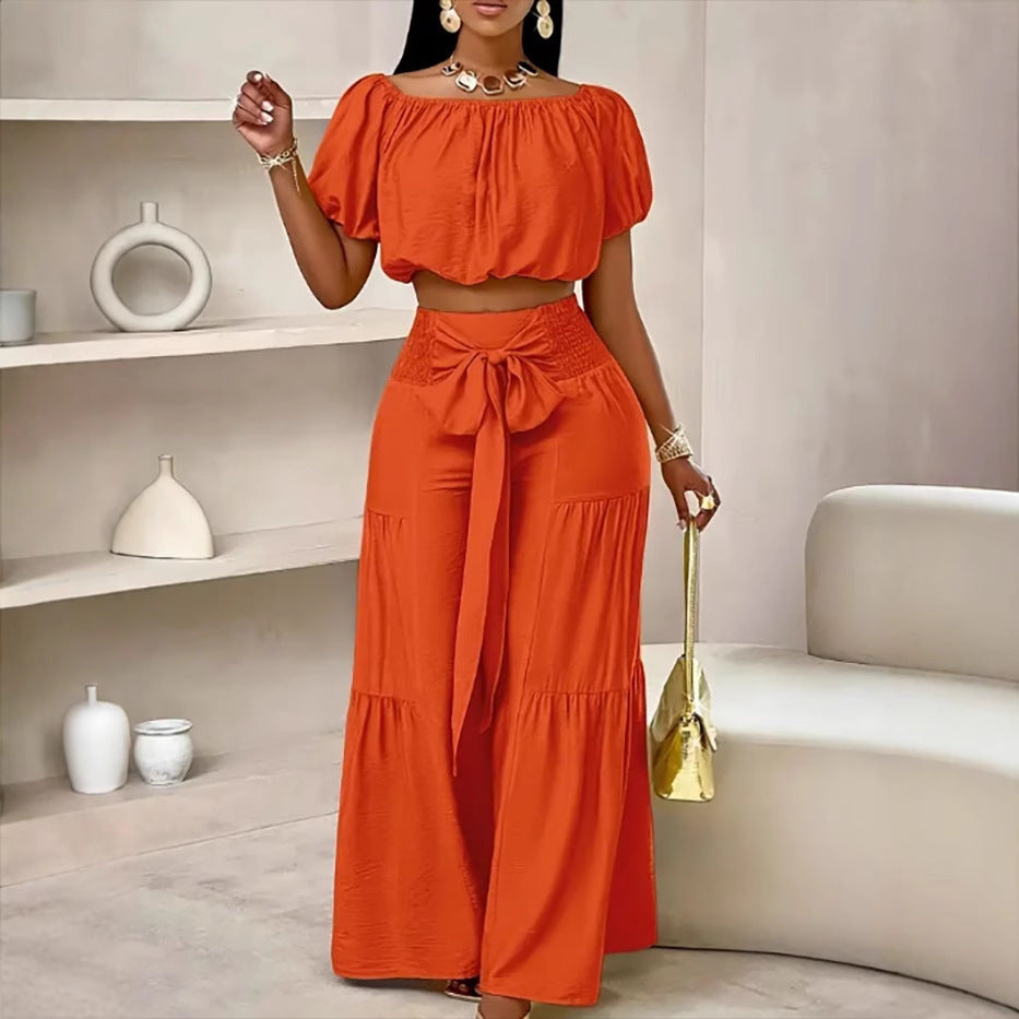 Woman Deep V-Neck Crop Top and High-Waisted Palazzo Pants Lune London