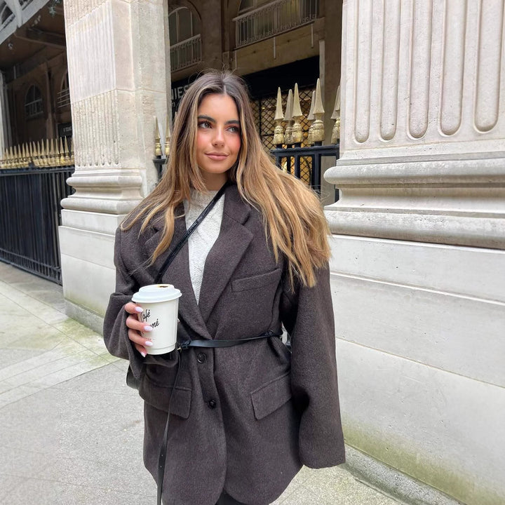 Oversized women's jacket with belt and chic stylish details