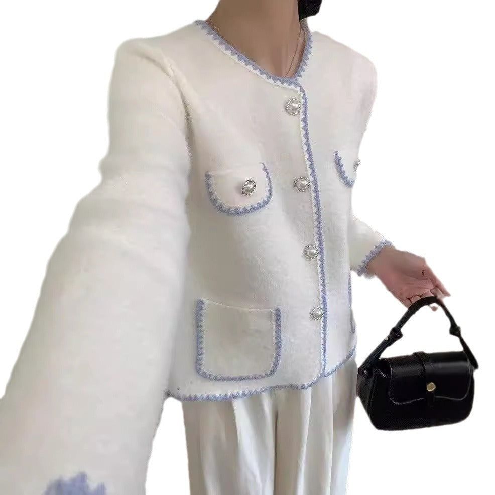 Ladies Elegant knitted vest with pockets adorned with beads and feminine accents Lune London