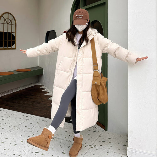 Elegant long parka for ladies with practical hood and warm padding Lune London