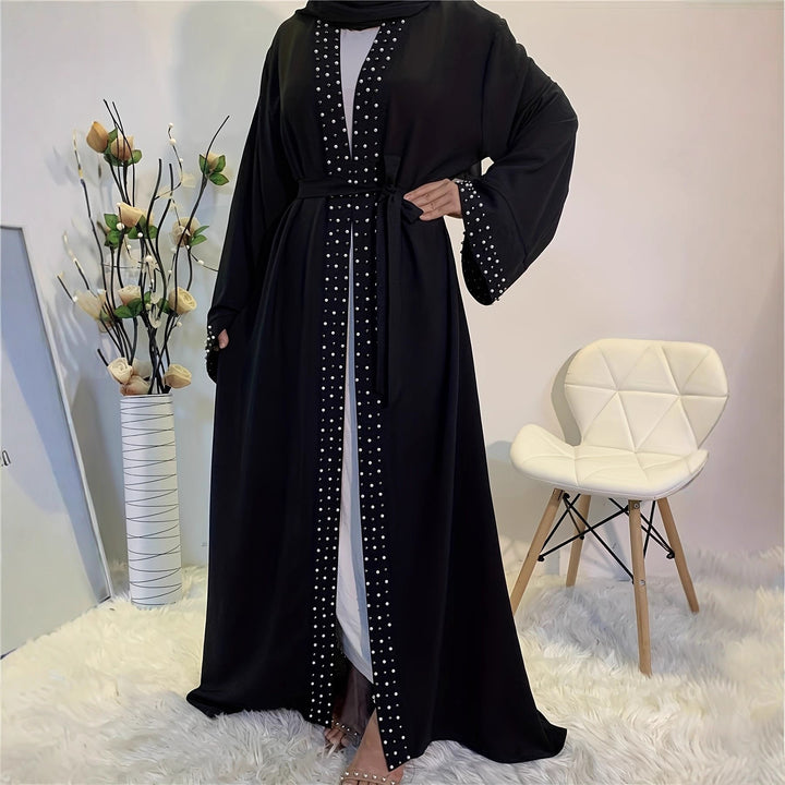 Elegant ladies Abaya with elaborate rhinestone details and a chic waist belt
