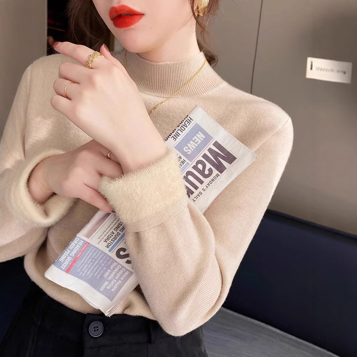 Pull à manches courtes pour femmes avec un col roulé stylé et une coupe décontractée Chic & Stil