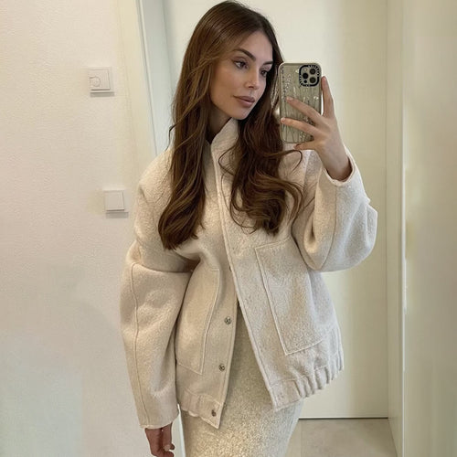 Oversized knit jacket for women in soft teddy fabric with a high collar and side pockets Lune London