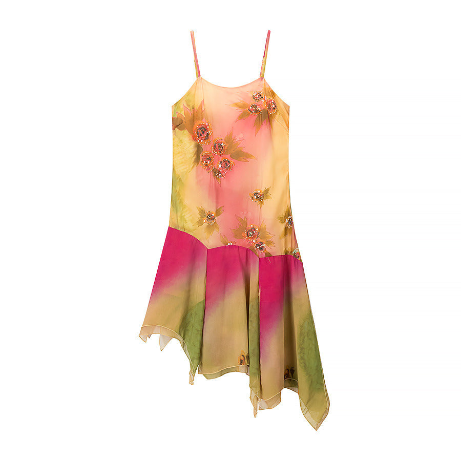 Asymmetrical summer dress for women with a floral design and delicate spaghetti straps Lune London
