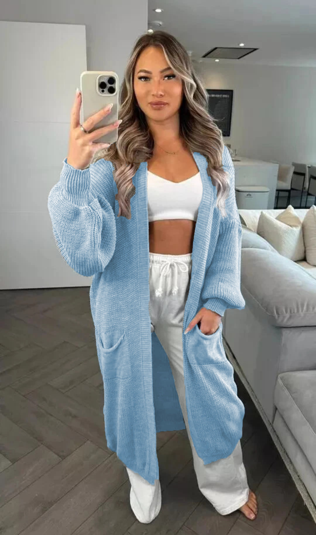 Chunky knit cardigan for women with a relaxed oversized style with practical pockets Lune Londonl