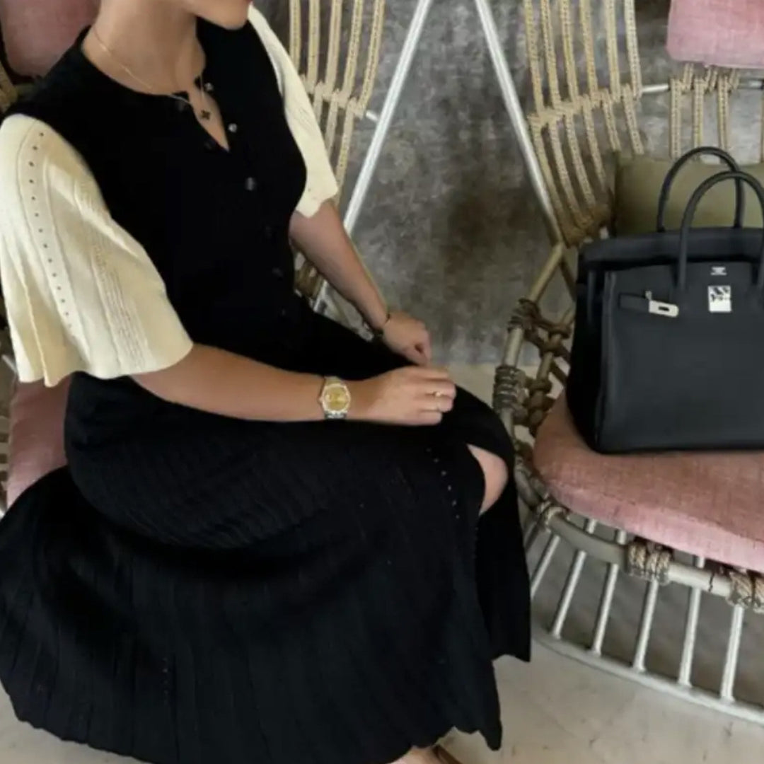 Midi dress for women with an elegant ruffled hem and a fine button detail Lune London