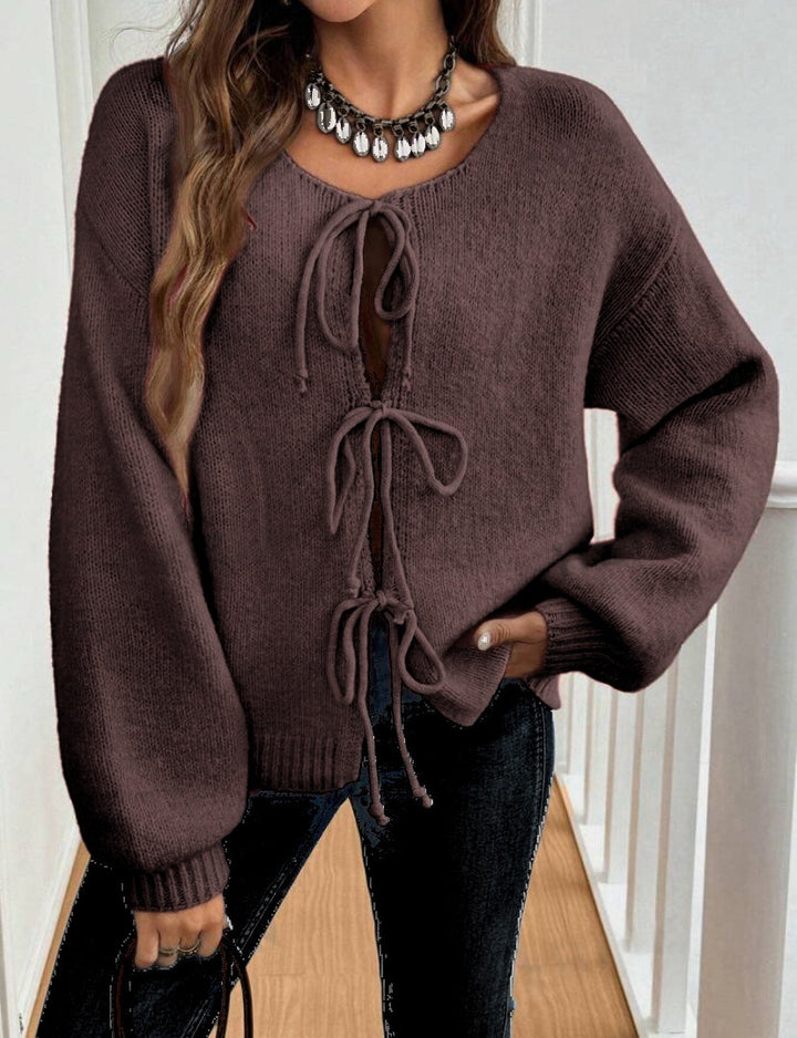 Women's knit sweater with a decorative lace-up design and casual balloon sleeves Lune London