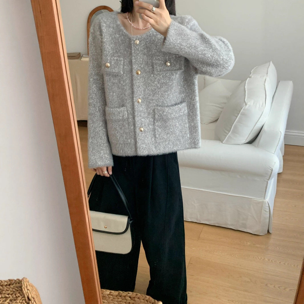 Veste en tricot confortable pour femmes avec détails en bouton et poches plaquées Chic & Stil