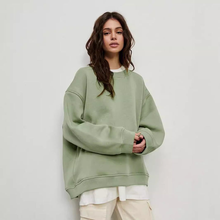 Woman Oversized sweatshirt with a relaxed fit and modern chic accents and style
