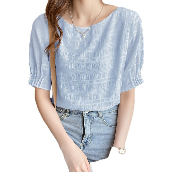 Haut féminin à la mode avec un design texturé léger et une coupe aérienne Chic & Stil