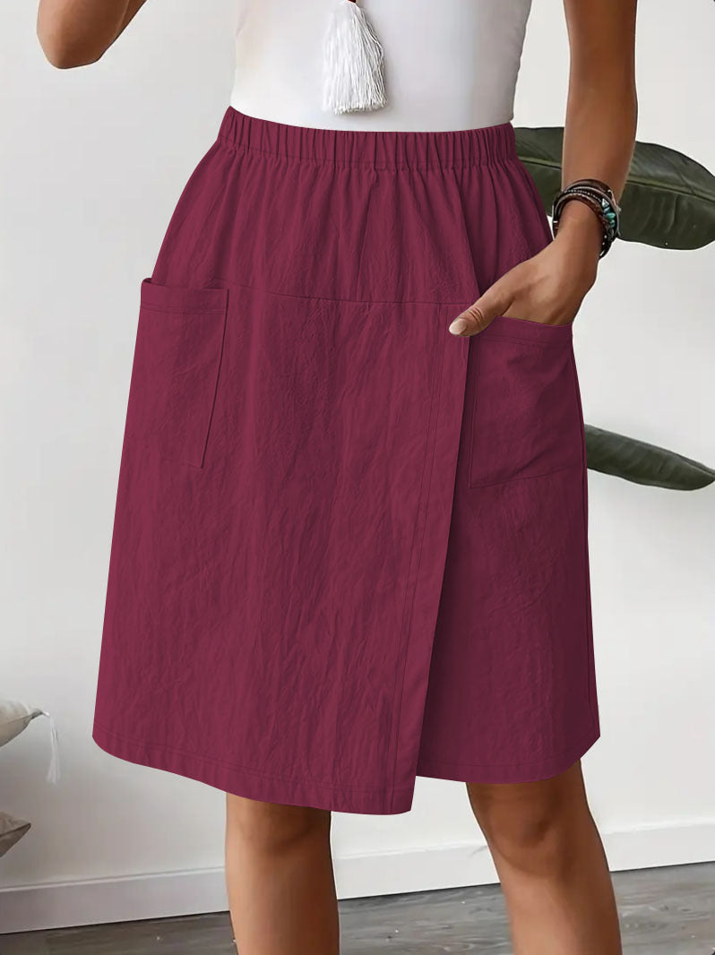 Mid-length wrap skirt for women with elastic waist and practical pockets Chic und Stil