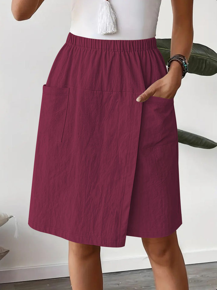 Mid-length wrap skirt for women with elastic waist and practical pockets Chic und Stil