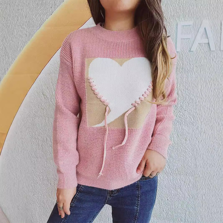 Pull féminin à la mode avec appliqué en forme de cœur et cordon de serrage à l'arrière Chic & Stil