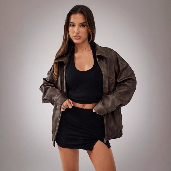 Ladies oversized sporty leather jacket with convenient pockets and elastic hem Lune London