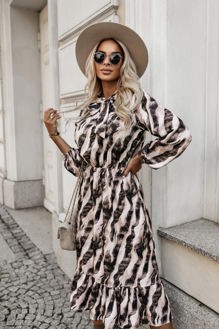 Maxi dress for ladies with an elegant striped pattern and practical pockets Lune London