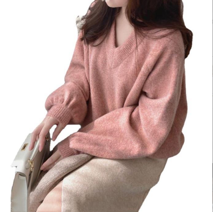 Chunky knit sweater for women with a deep V-neckline and voluminous sleeves Lune London