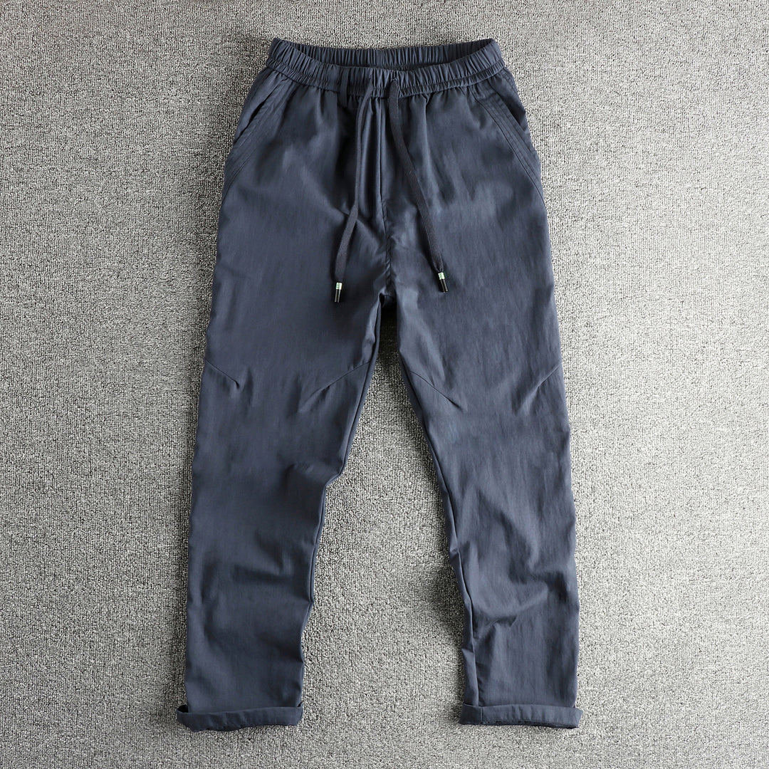 Men's athletic leisure pants with elastic waistband and practical drawstring Lune London