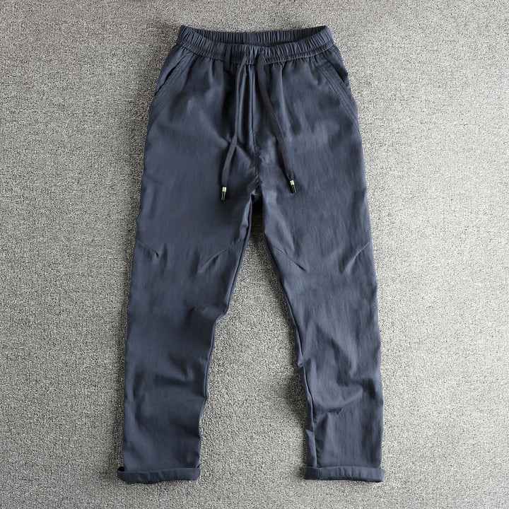 Men's athletic leisure pants with elastic waistband and practical drawstring Lune London