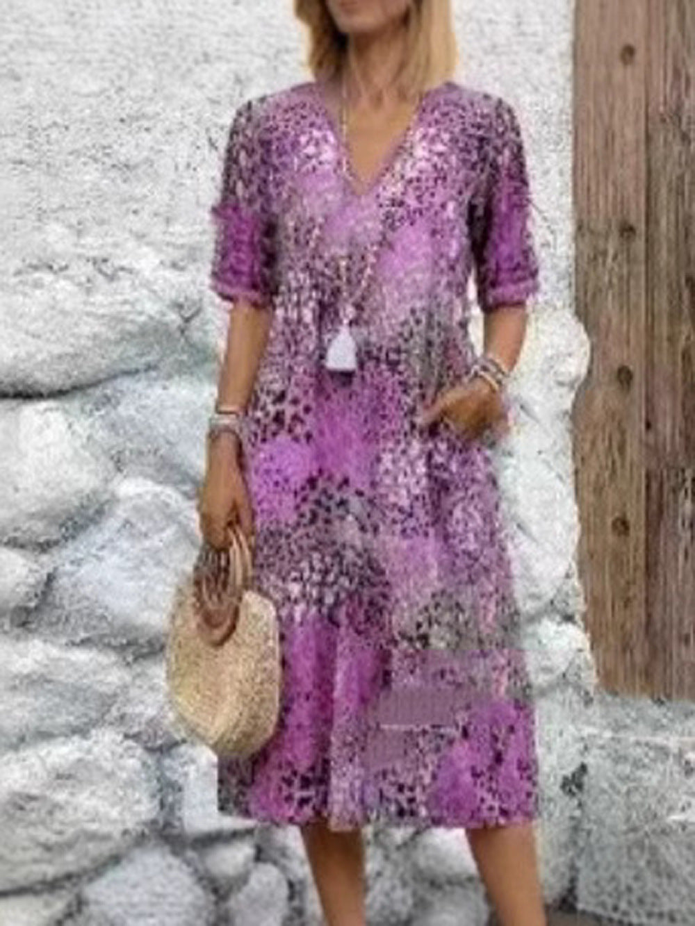 Maxi dress for women with V-neckline and practical side pockets Lune London