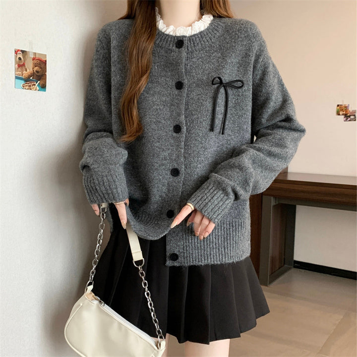 Knit cardigan for women with decorative buttons and a bow accent Lune London