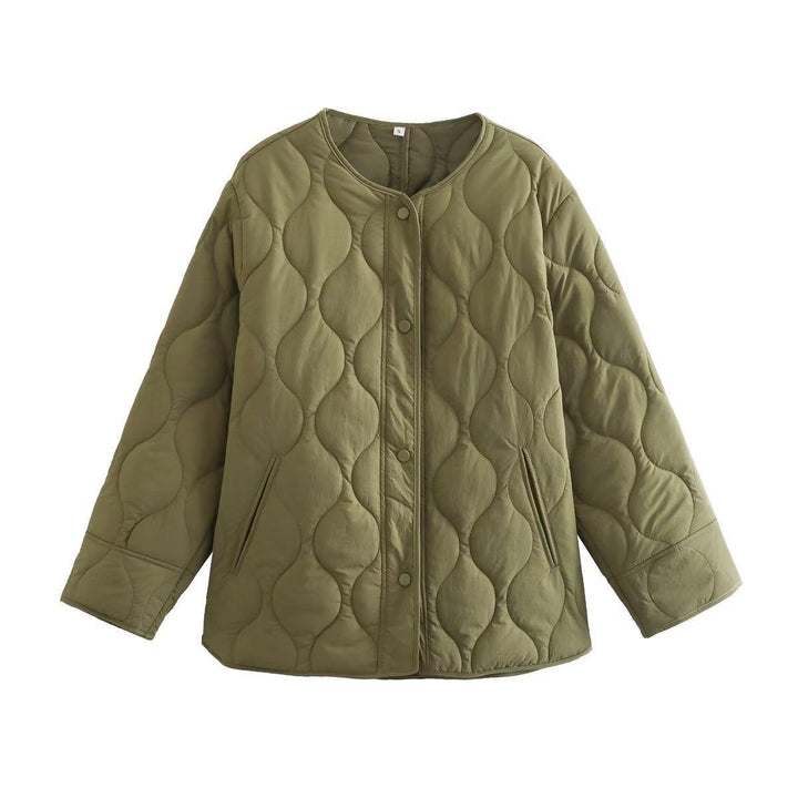 Quilted transition jacket for women with practical button closure and warm inner lining Lune London