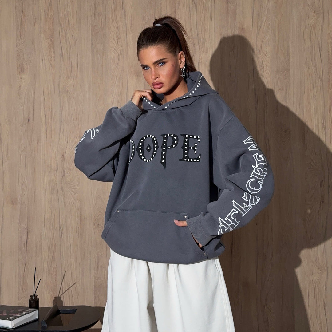 Ladies oversized hoodie with striking stone decoration and creative prints on the sleeves Lune London